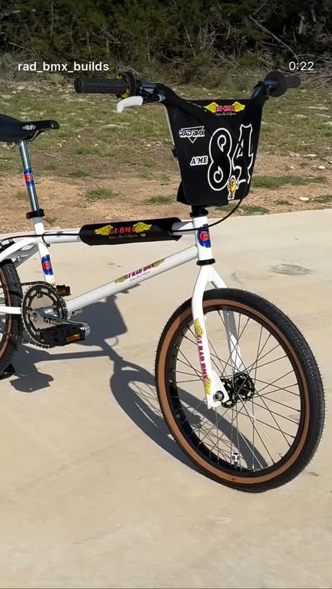 White GT BMX with chrome parts and race number 84